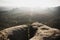 Sunrise panorama edge cliff crack crevasse at Kleiner Winterberg Saxony Switzerland Elbe Sandstone Mountains Germany