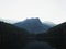 Sunrise panorama mirror reflection view of alpine forest mountain lake Piburger See Oetztal Alps Tyrol Austria Europe