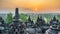 Sunrise panorama of Mount Merapi, Borobudur valey covered with mist and 9th century Stone Stupa at Borobudur Buddhist temple.