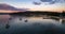 Sunrise panorama over the bay with boats and wharf