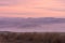 Sunrise in pink colours near Underberg in the Drakensberg mountain range in South Africa