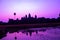 Sunrise Purple bathing pool of Angkor Wat facade silhouette part of the Angkor Cambodia