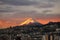 Sunrise in Quito city with Cotopaxi volcano in the background