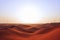 Sunrise on the red sand dunes of the Arabian desert in Riyadh, Saudi Arabia. Bright future, new beginnings, symbol of hope.