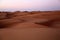 Sunrise on the red Wahiba sands of Oman