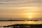 Sunrise and reflection at hannafore point Looe uk