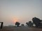sunrise with road and trees in rural areas of Pakistan