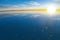 Sunrise on Salar de Uyuni in Bolivia covered with water, salt flat desert and sky reflections