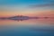 Sunrise on Salar de Uyuni in Bolivia covered with water, salt flat desert and sky reflections