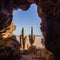 Sunrise on the salt flat of Uyuni inside a cave with cactus in front, Bolivia