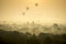 Sunrise scene hot air balloons fly over pagoda ancient city field in Bagan Myanmar.High image quality