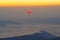 Sunrise scene with red sun over the mountains