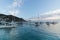 Sunrise seascape in Avalon harbor looking toward the Casino with sailboats, fishing boats and yachts moored in calm bay