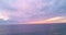 Sunrise seascape with clouds. Sea or ocean sunset time lapse. Background of sky timelapse of cloudy sky, sunrise beach.
