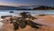 Sunrise seascape panorama at the beach with low cloud bank