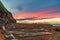 Sunrise at the seaside with clouds and tessellated rock platform