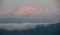 Sunrise showing red mountain peaks at Kausani, India