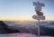 Sunrise in snowy mountains with wavy clouds