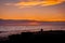 Sunrise Splendor for a Man on the Beach and Gulls in the Sky