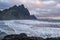 Sunrise Stokksnes cape sea beach and Vestrahorn Mountain with and ocean surf. Amazing nature scenery, popular travel destination