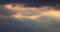 Sunrise. Sun beams shining through moving dramatic white clouds. Cloudy blue sunset sky, 4k video