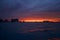 Sunrise or sunrise overlooking the sea and a line of hotels in Cancun