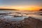 Sunrise from the Sydney Coast with foregrund rock pools