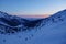 Sunrise in Tatry mountains on a winter hiking trail leading to Kopa Kondracka, Zakopane, Poland