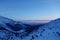 Sunrise in Tatry mountains on a winter hiking trail leading to Kopa Kondracka, Zakopane, Poland