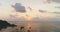 Sunrise Thailand\'s ocean aerial: yachts, ships, boats, on blue water under cloudy sky at Tanote Bay