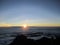 Sunrise at the top of Mount Rinjani in Lombok Island, Indonesia. View of crater lake covered in clouds from the summit. Beautiful