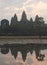 A sunrise with UNESCO Angkor Wat Temple reflection near Siem Reap in Cambodia