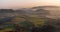 sunrise in the valley of a beautiful green field in spring with fog, Czech Beskydy Frenstat pod Radhostem