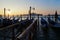 Sunrise in Venice with gondolas