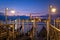 Sunrise at Venice with gondolas and street lamps