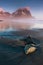 Sunrise at Vestrahorn Stokksnes Mountain Range with Brunnhorn Mountain also visible in the distance. Iceland. Seascape