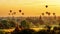 Sunrise view of beautiful pagodas and hot air balloons, Myanmar