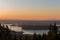 A sunrise view of downtown Vancouver, Stanley Park, and the Lions Gate Bridge as seen from Cypress Mountain.