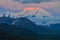 Sunrise view of Mount Denali - mt Mckinley peak with red alpenglow from Stony Dome overlook. Denali National Park and