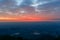 Sunrise view of mount tai. The direction of the mountains.The morning glow of sunrise.Clouds surge, colorful clouds at sunrise.