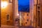 Sunrise view of a narrow street in the old town of Urbino in Ita