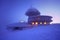 Sunrise view of Pec pod Snezkou in the Krkonose Mountains in winter. Czech Republic. Morning panoramic view above clouds.