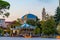 Sunrise view of Resurrection of Christ Orthodox Cathedral and carousel on Skanderbeg square in Tirana, Albania