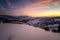 Sunrise view with snowy mountain slopes