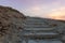 Sunrise  view of the stone steps of the path leading up to the ruins of the fortress of Masada