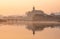 Sunrise view of symbolic Cishou Pagoda, Jinshan Temple, bridge amid fog