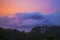 Sunrise with Volcano and Jungle in Pink and Purple