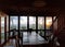 Sunrise into window of beachfront Waimanalo Beach house dinning room