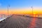 Sunrise at wooden pier on Baltic sea