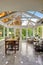 Sunroom patio area with transparent vaulted ceiling